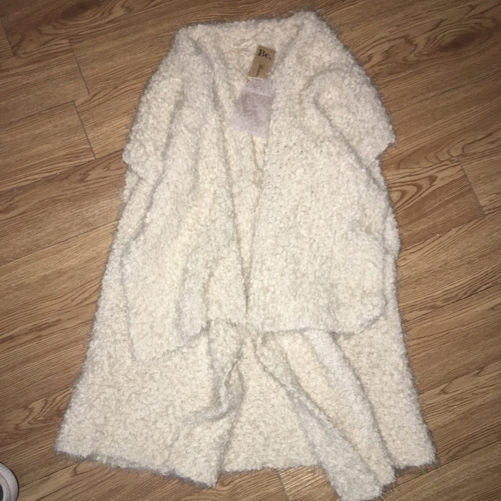 Sleeveless fuzzy white vest